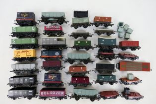 Hornby - Triang - An unboxed group of 33 items of OO/HO gauge freight rolling stock.