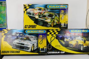 Scalextric - Three boxed Scalextric sets.