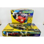 Scalextric - Two boxed Scalextric sets.