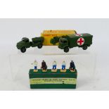 Dinky - A boxed set of 5 Train and Hotel Staff set # 5, a boxed Military Ambulance # 626,