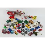 Corgi Toys - Dinky Toys - Matchbox - Others - An unboxed playworn collection of diecast vehicles in