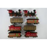 Hornby - Pixar - 2 x Toy Story steam locomotives with wagons and coaches.