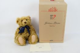 Steiff - A limited edition boxed 2002 Steiff 'Centenary Teddy Bear' - The #670985 blonde bear has