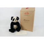 Steiff - A limited edition boxed Panda Steiff bear - The #661013 black and white bear has white