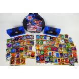 Bakugan - A Bakumat and two boxes of Bakugan Battle Brawlers cards.