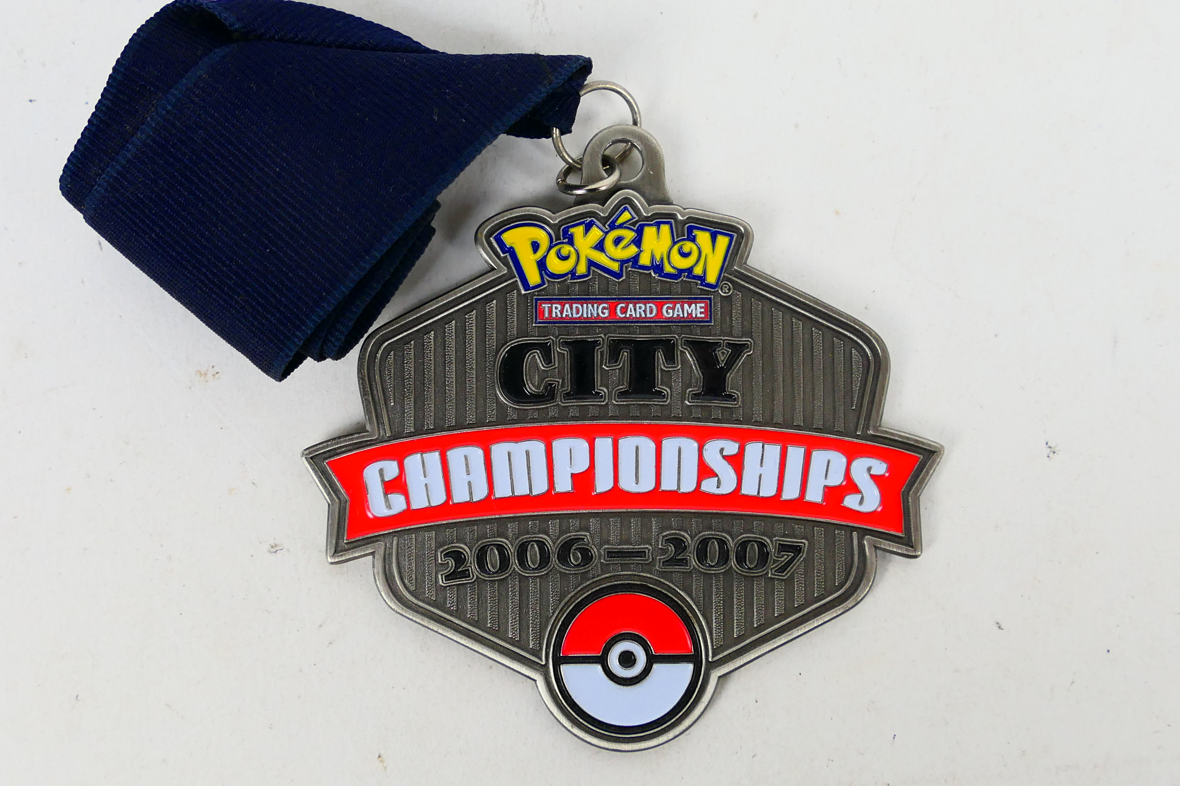 Pokemon - A 2007 Pokemon TCG United Kingdom National Championships City Champion medal and ribbon.