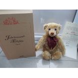 Steiff - a Year 2000 Teddy Bear, blond 43, with growler and ribbon to the neck,