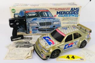 Tamiya - AMG Mercedes. A boxed Tamiya 1/12 scale #46019 AMG Mercedes C Class DTM D2 RC Car. 27.