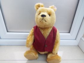 Steiff - Winnie the Pooh with red waistcoat, fitted growler,