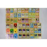 Pokemon - A very near complete set of Pokemon 'Base Set' trading cards.