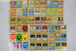 Pokemon - A very near complete set of Pokemon 'Base Set' trading cards.