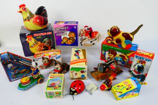 Kovap - Vintage Tinplate - A collection of boxed animal toys including a battery powered Hen Laying