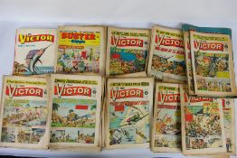 Victor - Buster - Over 70 copies of the vintage British comics 'Victor' and 'Lion'.