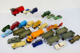 Dinky Toys - Corgi Toys - An unboxed group of playworn diecast model vehicles in various scales,