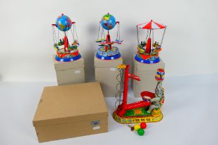 Joseph Wagner - Tinplate - 4 x boxed tinplate clockwork toys, 2 x are marked JW made in Germany.
