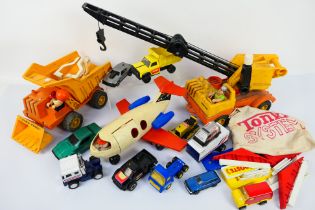 Fisher Price - Tonka. A selection of Thirteen loose Trucks and Haulage by Fisher Price and Tonka.