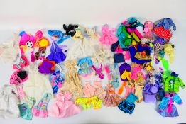 Mattel - Barbie - Over 30 unboxed Barbie doll outfits and accessories.