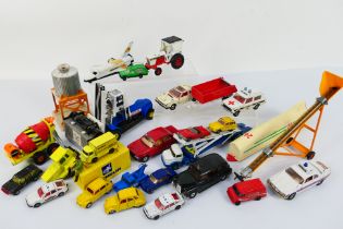 Corgi - A selection of Twenty-Three playworn diecast models in varying scales and ranging from