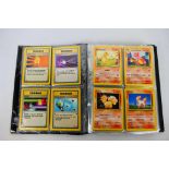 Pokemon TCG - A Pokemon TCG card file containing approximately 200 Base Set, Base Set 2,