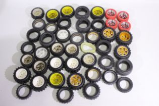 Kyosho - Tamiya - A collection of loose tyres and some wheels in various scales suitable for RC