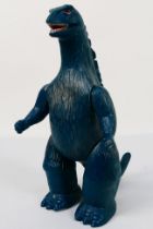 Bullmark - Tanguchi. A Kaiju Godzilla stamped with Tanguchi and Bullmark.