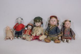 Asian Dolls - A group of Asian style dolls mostly of composite construction with finely painted