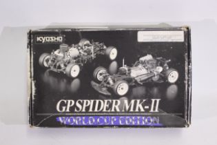 Kyosho - A quantity of mainly Kyosho spare parts suitable for RC car modelling.