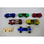 Hot Wheels - Redline - Mattel - A group of vintage Redline cars, the Indy Eagle with sticker sheet,