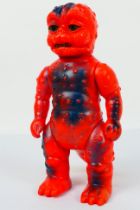 Bullmark - Tanguchi. A Kaiju Minilla stamped with Tanguchi and Japan.