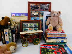 A mixed lot of car and model making books, with a small group of modern plush toys,