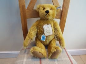 Steiff - a 1908 replica Teddy Bear with growler, blonde mohair, issued in a limited edition of 3000,