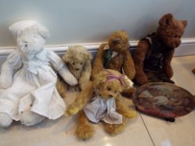 A sleuth of five Teddy Bears of various brands, each with certificates,