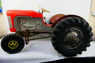 Tri-ang Sharna - A 1960s Tri-ang Harvester TM2010 pedal tractor.