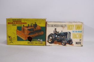 Louis Marx - 2 x boxed models, a Tricky Tommy Tractor and a Junior Bulldozer.