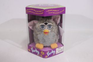 Hasbro - A boxed model #70-800 Generation 2 1998 Electronic Furby with grey fur appears Mint,
