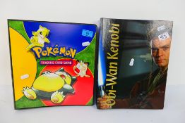 Pokemon - Topps - Two folders containing a quantity of trading cards.