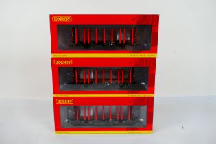 Hornby 3 x boxed OO gauge OTA timber wagons with tapered stanchions in EWS livery # R6972.