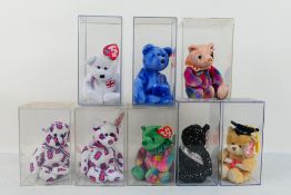 Ty Beanies - Eight Ty Beanies housed within perspex display cases.