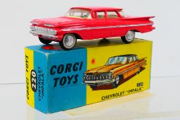 Corgi Toys - A boxed Corgi Toys #220 Chevrolet Impala.
