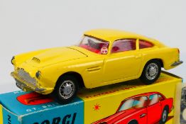 Corgi Toys - A boxed Corgi Toys # 218 Aston Martin DB4.