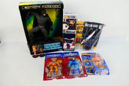 Mattel - He-Man - Batman - Funko - A group of boxed / carded figures including He-Man, Skeletor,