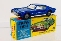 Corgi Toys - A boxed Corgi Toys #264 Oldsmobile Toronado.