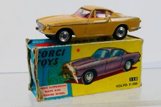 Corgi Toys - A boxed Corgi Toys #228 Volvo P1800.