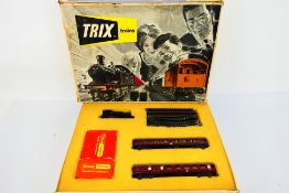Trix - A boxed OO gauge Trix Train Set # 1295 with an 0-6-0 tank engine number 32103,