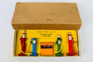 Dinky Toys - A boxed Pre-War Dinky Toys #49 Petrol Pumps & oil Bin Set. 7 Road Signs Set.