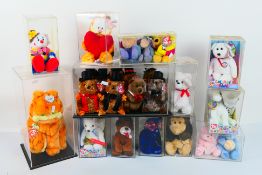 Ty Beanie Babies - Twenty-Six Beanie Babies in plastic display cases.