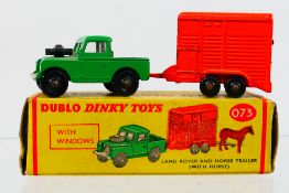 Dinky Dublo - A boxed Dinky Dublo #073 Land Rover & Horse Trailer (with horse).