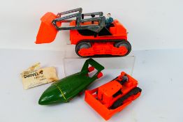 Louis Marx - 2 x battery operated models, a Bulldozer and a Junior Shovel-Dozer model.