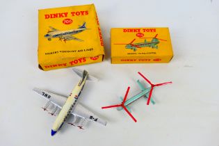 Dinky Toys - Two boxed diecast model aircraft.