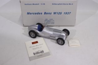 CMC - A 1937 Mercedes Benz W125 Grand Prix car in 1:18 scale # M-031.